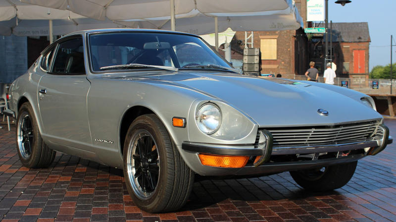 Cars That Carry A Flag, Lamborghini Miura, The Answer, Toyota 2000GT, Volkswagen Beetle, Ford GT40, Citroen DS, Datsun 240Z, Rolls-Royce Phantom, Renault 5 Turbo, Chevrolet Corvette C1, Koenigsegg Jesko, Fiat 500 (Cinquecento), Aston Martin DB5, Hyundai Pony, Tatra 87, Mazda MX-5 Miata NA, BMW M3 E30, Volvo P1800, Peugeot 205 GTI, Pontiac Firebird Trans Am, Pagani Zonda, SAAB 900 Turbo, Porsche 911 (1964)