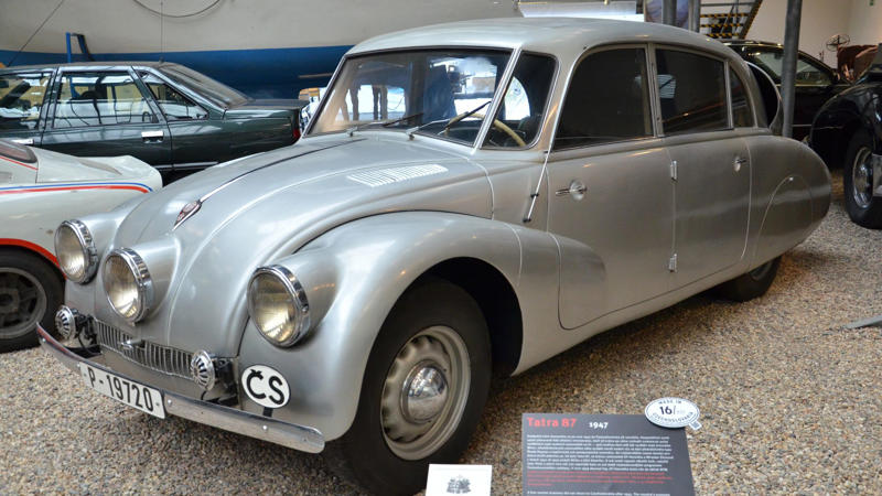 Cars That Carry A Flag, Lamborghini Miura, The Answer, Toyota 2000GT, Volkswagen Beetle, Ford GT40, Citroen DS, Datsun 240Z, Rolls-Royce Phantom, Renault 5 Turbo, Chevrolet Corvette C1, Koenigsegg Jesko, Fiat 500 (Cinquecento), Aston Martin DB5, Hyundai Pony, Tatra 87, Mazda MX-5 Miata NA, BMW M3 E30, Volvo P1800, Peugeot 205 GTI, Pontiac Firebird Trans Am, Pagani Zonda, SAAB 900 Turbo, Porsche 911 (1964)