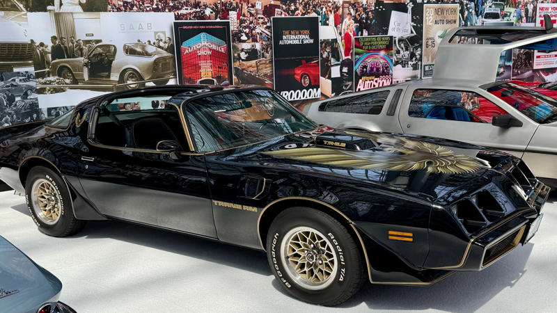 Cars That Carry A Flag, Lamborghini Miura, The Answer, Toyota 2000GT, Volkswagen Beetle, Ford GT40, Citroen DS, Datsun 240Z, Rolls-Royce Phantom, Renault 5 Turbo, Chevrolet Corvette C1, Koenigsegg Jesko, Fiat 500 (Cinquecento), Aston Martin DB5, Hyundai Pony, Tatra 87, Mazda MX-5 Miata NA, BMW M3 E30, Volvo P1800, Peugeot 205 GTI, Pontiac Firebird Trans Am, Pagani Zonda, SAAB 900 Turbo, Porsche 911 (1964)