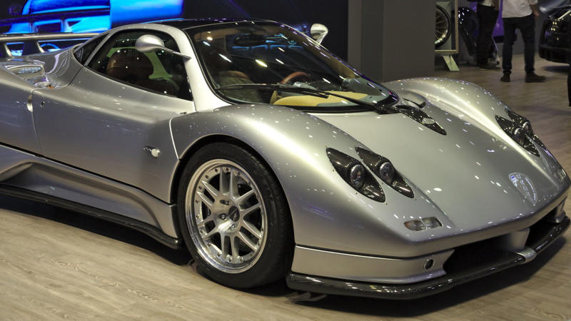 Cars That Carry A Flag, Lamborghini Miura, The Answer, Toyota 2000GT, Volkswagen Beetle, Ford GT40, Citroen DS, Datsun 240Z, Rolls-Royce Phantom, Renault 5 Turbo, Chevrolet Corvette C1, Koenigsegg Jesko, Fiat 500 (Cinquecento), Aston Martin DB5, Hyundai Pony, Tatra 87, Mazda MX-5 Miata NA, BMW M3 E30, Volvo P1800, Peugeot 205 GTI, Pontiac Firebird Trans Am, Pagani Zonda, SAAB 900 Turbo, Porsche 911 (1964)