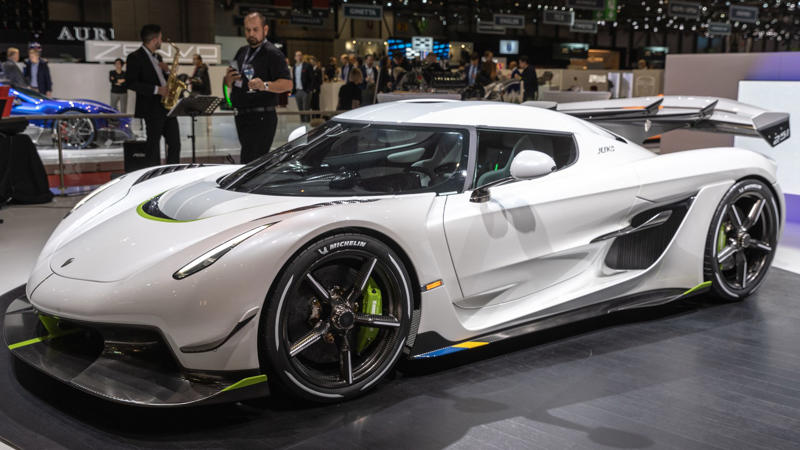 Cars That Carry A Flag, Lamborghini Miura, The Answer, Toyota 2000GT, Volkswagen Beetle, Ford GT40, Citroen DS, Datsun 240Z, Rolls-Royce Phantom, Renault 5 Turbo, Chevrolet Corvette C1, Koenigsegg Jesko, Fiat 500 (Cinquecento), Aston Martin DB5, Hyundai Pony, Tatra 87, Mazda MX-5 Miata NA, BMW M3 E30, Volvo P1800, Peugeot 205 GTI, Pontiac Firebird Trans Am, Pagani Zonda, SAAB 900 Turbo, Porsche 911 (1964)