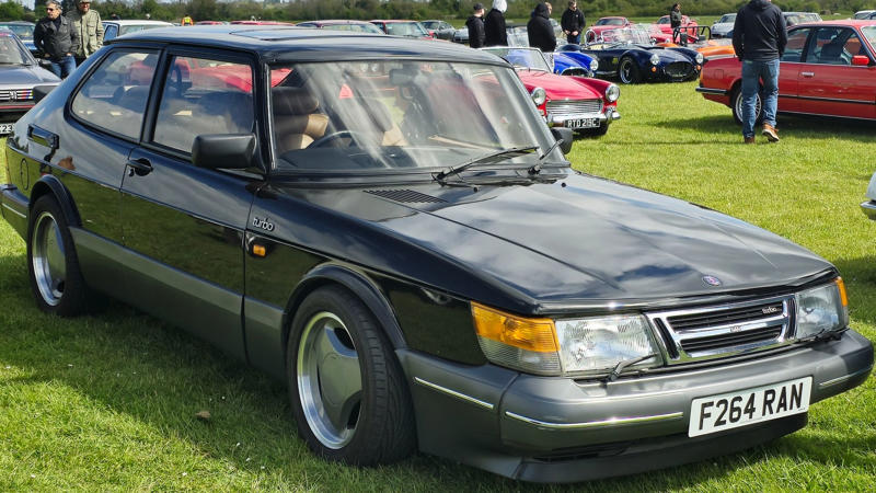Cars That Carry A Flag, Lamborghini Miura, The Answer, Toyota 2000GT, Volkswagen Beetle, Ford GT40, Citroen DS, Datsun 240Z, Rolls-Royce Phantom, Renault 5 Turbo, Chevrolet Corvette C1, Koenigsegg Jesko, Fiat 500 (Cinquecento), Aston Martin DB5, Hyundai Pony, Tatra 87, Mazda MX-5 Miata NA, BMW M3 E30, Volvo P1800, Peugeot 205 GTI, Pontiac Firebird Trans Am, Pagani Zonda, SAAB 900 Turbo, Porsche 911 (1964)