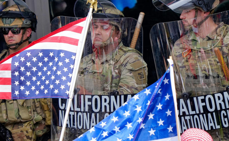Guardsmen facing protesters at federal building Governor Newsom at CNN Presidential Debate, Guardsmen facing protesters at federal building, Trump at roundtable on criminal justice reform, Marines guarding federal building in Los Angeles, Trump addressing Congress at Capitol, Newsom visiting storm-damaged Montecito area, Trump addresses Congress on early achievements, Protesters in Newark against Trump, Newsom speaks on flooded Tulare Lake