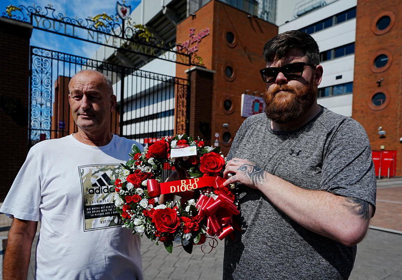 Key points, Jota's teammates pay tribute, Diogo Jota's career timeline, 'I will always remember your smile' says Darwin Nunez, Police confirm no other vehicles involved in crash, Pictured: Where Jota and Silva crashed in Spain, Rayner describes Jota's death as 'absolutely heartbreaking' as she visits Anfield, Local authorities issue statement on Jota and Silva's deaths, Liverpool LeBron James reacts to Jota's death, Watch: Starmer pays tribute to Jota after Liverpool player's death, Jota and brother's boyhood club pay tribute amid 'pain and disbelief', Steven Gerrard sends condolences to Jota's loved ones at 'incredibly sad time', Starmer pays tribute to Jota after ‘devastating’ news, Portuguese Football Federation statement in full after deaths of Jota and Silva, Jamie Carragher 'in state of shock' after Jota's death, Manchester United sends 'deepest condolences' to Jota's and brother's loved ones, Jota's former club Wolves 'heartbroken' at 'adored' player's death, Pictured: Liverpool fans pay tribute to Jota, Everyone at Everton 'deeply saddened' by deaths of Jota and brother, Pictured: Floral tributes to Jota laid at Anfield Stadium, Watch: Lisa Nandy pays tribute to Diogo in House of Commons, Mapped: Where Jota and his brother crashed in Spain, Livepool 'absolutely heartbroken' at Jota's death, Brothers' car caught fire due to burst tyre, initial investigations suggest, UEFA says European football community 'deeply saddened at Diogo Jota's tragic passing', Manchester City 'shocked and saddened' at Diogo Jota's death, ‘Devastated’ FA sends condolences to Jota’s loved ones and teammates, Liverpool FC 'devastated' at Diogo Jota’s death, Diogo Jota's heartbreaking final social media post on his wedding revealed, Carragher pays tribute to Jota, Jota recently married partner, Watch: Diogo Jota dies in car accident aged 28, FIFPRO 'deeply saddened' by deaths of Jota and brother, Sporting CP sends condolences, UK culture secretary pays tribute to Jota, No other vehicles involved in crash, FC Porto send condolences, Tributes come in for Jota, Gary Neville pays tribute to Jota, Spanish Guardia Civil statement, Jota married his partner 11 days ago, Portuguese Prime Minister says Jota death 'tragic', Portguese Football Federation confirm Jota death, Diogo Jota tragically passes away, Emergency services confirm car crash, Diogo Jota passes away in car accident aged 28