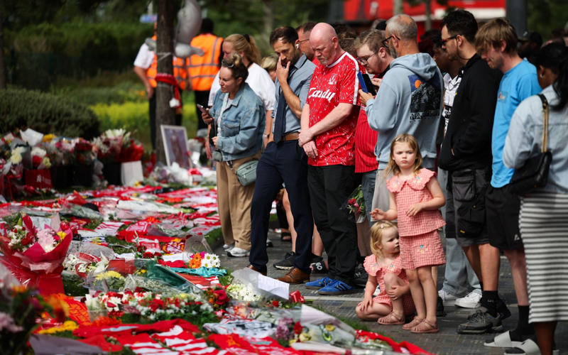 07:09 PM BST, Hughes and Edwards: ‘We feel utterly bereft’, 07:03 PM BST, Pogba posts, 06:49 PM BST, Statement from Fenway Sport Group, 06:40 PM BST, Slot: ‘The pain is so raw’, 05:55 PM BST, Bruno Fernandes posts, 04:50 PM BST, PSG pay tribute, 04:38 PM BST, Bayern do similar at training, 04:32 PM BST, Chelsea pay tribute, 04:14 PM BST, Real Madrid mark Jota’s passing, 03:44 PM BST, Messi posts on Instagram, 03:26 PM BST, More from Jota’s former team Wolves, 02:54 PM BST, Harvey Elliott pays tribute, 02:38 PM BST, Some of the messages left for Jota at Anfield, 02:31 PM BST, Dalglish: ‘Football is not important at this sad time’, 02:16 PM BST, More pictures from outside Anfield, 01:47 PM BST, The Prince and Princess of Wales pay tribute, 01:40 PM BST, More tributes flooding in, 01:37 PM BST, ‘A possible speeding incident’, 01:32 PM BST, Jota ‘will never walk alone’, 01:30 PM BST, Updates from Liverpool, 01:28 PM BST, Map showing location of crash, 01:24 PM BST, Jurgen Klopp: ‘A great friend, loving husband and father’, 01:21 PM BST, Wimbledon reacts to tragedy, 01:15 PM BST, Jamie Carragher on Jota’s death, 01:10 PM BST, Re-live Jota’s finest moments, 01:07 PM BST, Pictured: Crash site, 12:58 PM BST, Darwin Nunez: ‘There are no words of comfort’, 12:54 PM BST, What we know so far..., 12:45 PM BST, Watch: Flag raised at half mast at Anfield, 12:34 PM BST, Deputy Prime Minister visits floral tribute, 12:17 PM BST, Jota death evokes Reyes memories, 12:14 PM BST, Watch: Jota’s message to Liverpool fan, 12:05 PM BST, Watch: the last goal Jota scored for Liverpool, 12:02 PM BST, Emotional scenes at Anfield, 11:48 AM BST, Pictured: A relationship of childhood sweethearts, 11:41 AM BST, Basketball star lends voice to tributes, 11:36 AM BST, ‘Irreparable losses for Portuguese Football’, 11:30 AM BST, Statement from Prime Minister, 11:25 AM BST, Premier League clubs pay tribute, 11:20 AM BST, Ronaldo: ‘It doesn’t make sense’, 11:18 AM BST, Andre Silva with brother at Porto in 2016, 11:12 AM BST, Minute’s silence from Uefa, 11:09 AM BST, Fans already leaving tributes at Anfield, 11:04 AM BST, Pictured: Crash site, 11:01 AM BST, Former club releases statement, 10:56 AM BST, Everton and Manchester United send condolences, 10:54 AM BST, Uefa ‘deeply saddened’ by Jota’s death, 10:49 AM BST, In pictures: Jota’s wedding to childhood sweetheart, 10:47 AM BST, Jota’s ex-Wolves teammates pay tribute, 10:42 AM BST, Pictured: Jota and family celebrate Premier League title, 10:40 AM BST, Jota died ‘after Lamborghini tyre burst’, 10:28 AM BST, Liverpool FC ‘devastated’ by ‘unimaginable loss’, 10:26 AM BST, Jota married childhood sweetheart two weeks ago, 10:22 AM BST, Jota was due to report back for training, 10:16 AM BST, Carragher: ‘I am absolutely devastated’, 10:12 AM BST, Investigation ‘suggests tyre burst’