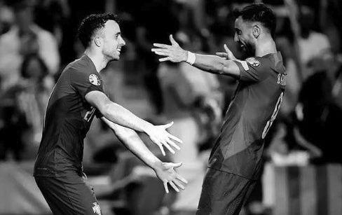 07:09 PM BST, Hughes and Edwards: ‘We feel utterly bereft’, 07:03 PM BST, Pogba posts, 06:49 PM BST, Statement from Fenway Sport Group, 06:40 PM BST, Slot: ‘The pain is so raw’, 05:55 PM BST, Bruno Fernandes posts, 04:50 PM BST, PSG pay tribute, 04:38 PM BST, Bayern do similar at training, 04:32 PM BST, Chelsea pay tribute, 04:14 PM BST, Real Madrid mark Jota’s passing, 03:44 PM BST, Messi posts on Instagram, 03:26 PM BST, More from Jota’s former team Wolves, 02:54 PM BST, Harvey Elliott pays tribute, 02:38 PM BST, Some of the messages left for Jota at Anfield, 02:31 PM BST, Dalglish: ‘Football is not important at this sad time’, 02:16 PM BST, More pictures from outside Anfield, 01:47 PM BST, The Prince and Princess of Wales pay tribute, 01:40 PM BST, More tributes flooding in, 01:37 PM BST, ‘A possible speeding incident’, 01:32 PM BST, Jota ‘will never walk alone’, 01:30 PM BST, Updates from Liverpool, 01:28 PM BST, Map showing location of crash, 01:24 PM BST, Jurgen Klopp: ‘A great friend, loving husband and father’, 01:21 PM BST, Wimbledon reacts to tragedy, 01:15 PM BST, Jamie Carragher on Jota’s death, 01:10 PM BST, Re-live Jota’s finest moments, 01:07 PM BST, Pictured: Crash site, 12:58 PM BST, Darwin Nunez: ‘There are no words of comfort’, 12:54 PM BST, What we know so far..., 12:45 PM BST, Watch: Flag raised at half mast at Anfield, 12:34 PM BST, Deputy Prime Minister visits floral tribute, 12:17 PM BST, Jota death evokes Reyes memories, 12:14 PM BST, Watch: Jota’s message to Liverpool fan, 12:05 PM BST, Watch: the last goal Jota scored for Liverpool, 12:02 PM BST, Emotional scenes at Anfield, 11:48 AM BST, Pictured: A relationship of childhood sweethearts, 11:41 AM BST, Basketball star lends voice to tributes, 11:36 AM BST, ‘Irreparable losses for Portuguese Football’, 11:30 AM BST, Statement from Prime Minister, 11:25 AM BST, Premier League clubs pay tribute, 11:20 AM BST, Ronaldo: ‘It doesn’t make sense’, 11:18 AM BST, Andre Silva with brother at Porto in 2016, 11:12 AM BST, Minute’s silence from Uefa, 11:09 AM BST, Fans already leaving tributes at Anfield, 11:04 AM BST, Pictured: Crash site, 11:01 AM BST, Former club releases statement, 10:56 AM BST, Everton and Manchester United send condolences, 10:54 AM BST, Uefa ‘deeply saddened’ by Jota’s death, 10:49 AM BST, In pictures: Jota’s wedding to childhood sweetheart, 10:47 AM BST, Jota’s ex-Wolves teammates pay tribute, 10:42 AM BST, Pictured: Jota and family celebrate Premier League title, 10:40 AM BST, Jota died ‘after Lamborghini tyre burst’, 10:28 AM BST, Liverpool FC ‘devastated’ by ‘unimaginable loss’, 10:26 AM BST, Jota married childhood sweetheart two weeks ago, 10:22 AM BST, Jota was due to report back for training, 10:16 AM BST, Carragher: ‘I am absolutely devastated’, 10:12 AM BST, Investigation ‘suggests tyre burst’