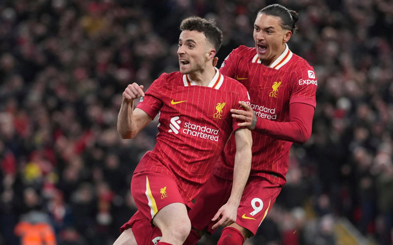 07:09 PM BST, Hughes and Edwards: ‘We feel utterly bereft’, 07:03 PM BST, Pogba posts, 06:49 PM BST, Statement from Fenway Sport Group, 06:40 PM BST, Slot: ‘The pain is so raw’, 05:55 PM BST, Bruno Fernandes posts, 04:50 PM BST, PSG pay tribute, 04:38 PM BST, Bayern do similar at training, 04:32 PM BST, Chelsea pay tribute, 04:14 PM BST, Real Madrid mark Jota’s passing, 03:44 PM BST, Messi posts on Instagram, 03:26 PM BST, More from Jota’s former team Wolves, 02:54 PM BST, Harvey Elliott pays tribute, 02:38 PM BST, Some of the messages left for Jota at Anfield, 02:31 PM BST, Dalglish: ‘Football is not important at this sad time’, 02:16 PM BST, More pictures from outside Anfield, 01:47 PM BST, The Prince and Princess of Wales pay tribute, 01:40 PM BST, More tributes flooding in, 01:37 PM BST, ‘A possible speeding incident’, 01:32 PM BST, Jota ‘will never walk alone’, 01:30 PM BST, Updates from Liverpool, 01:28 PM BST, Map showing location of crash, 01:24 PM BST, Jurgen Klopp: ‘A great friend, loving husband and father’, 01:21 PM BST, Wimbledon reacts to tragedy, 01:15 PM BST, Jamie Carragher on Jota’s death, 01:10 PM BST, Re-live Jota’s finest moments, 01:07 PM BST, Pictured: Crash site, 12:58 PM BST, Darwin Nunez: ‘There are no words of comfort’, 12:54 PM BST, What we know so far..., 12:45 PM BST, Watch: Flag raised at half mast at Anfield, 12:34 PM BST, Deputy Prime Minister visits floral tribute, 12:17 PM BST, Jota death evokes Reyes memories, 12:14 PM BST, Watch: Jota’s message to Liverpool fan, 12:05 PM BST, Watch: the last goal Jota scored for Liverpool, 12:02 PM BST, Emotional scenes at Anfield, 11:48 AM BST, Pictured: A relationship of childhood sweethearts, 11:41 AM BST, Basketball star lends voice to tributes, 11:36 AM BST, ‘Irreparable losses for Portuguese Football’, 11:30 AM BST, Statement from Prime Minister, 11:25 AM BST, Premier League clubs pay tribute, 11:20 AM BST, Ronaldo: ‘It doesn’t make sense’, 11:18 AM BST, Andre Silva with brother at Porto in 2016, 11:12 AM BST, Minute’s silence from Uefa, 11:09 AM BST, Fans already leaving tributes at Anfield, 11:04 AM BST, Pictured: Crash site, 11:01 AM BST, Former club releases statement, 10:56 AM BST, Everton and Manchester United send condolences, 10:54 AM BST, Uefa ‘deeply saddened’ by Jota’s death, 10:49 AM BST, In pictures: Jota’s wedding to childhood sweetheart, 10:47 AM BST, Jota’s ex-Wolves teammates pay tribute, 10:42 AM BST, Pictured: Jota and family celebrate Premier League title, 10:40 AM BST, Jota died ‘after Lamborghini tyre burst’, 10:28 AM BST, Liverpool FC ‘devastated’ by ‘unimaginable loss’, 10:26 AM BST, Jota married childhood sweetheart two weeks ago, 10:22 AM BST, Jota was due to report back for training, 10:16 AM BST, Carragher: ‘I am absolutely devastated’, 10:12 AM BST, Investigation ‘suggests tyre burst’