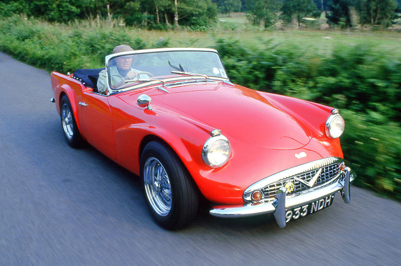 Daimler SP250 The mighty V8 is falling., Aston Martin V8 Vantage, Bentley Arnage T, Cadillac CTS-V, Chevrolet Corvette, Daimler SP250, Dodge Challenger, Ferrari 355, Ford Mustang, Jaguar XJR, Jensen Interceptor, Lotus Esprit, McLaren P1, Mercedes-AMG C63, Morgan Plus 8, Porsche 928, Range Rover, Rolls-Royce Silver Shadow, Rover P5B, Toyota Land Cruiser, Vauxhall VXR8