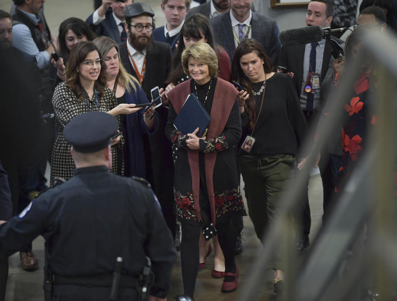 Senator Murkowski entering Senate chambers for trial Senator Lisa Murkowski speaking at a hearing, Statue of William Seward near Alaska Capitol, Senator Murkowski during Doug Burgum’s nomination hearing, Senator Murkowski arriving for Trump’s impeachment trial, Senator Murkowski questioning Secretary Haaland, Senator Murkowski at a budget hearing with Secretary Haaland, Senator Murkowski entering Senate chambers for trial