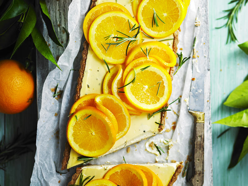 Popular orange varieties for these recipes, Orange recipes to try, Julie Goodwin’s orange almond cake , Flourless orange & white chocolate cake , Double-crumbed pork cotoletta with radicchio & orange salad , Whole orange slice , Orange and blueberry syrup cake , Sugar-free rosemary, labne and orange tart , Hummingbird slice with orange icing , Dark chocolate and orange Christmas slice , Cherry coconut and orange cake , Sweet pea, cinnamon and orange cake , Confit duck & candied orange salad , Chocolate parfait with orange salad , Beetroot and orange salad , Pan-fried fish with radicchio and orange salad , Blood-orange glazed ham , Blood orange hazelnut cake , How to make a chocolate orange ‘tiger’ bundt cake , Green salad with red currants & orange dressing , Orange, poppy seed & olive oil mug cake , Maple, mustard and orange glazed ham , How to choose the best oranges for these recipes, How to remove wax from oranges, Should oranges be stored in or out of the fridge?, How to segment an orange