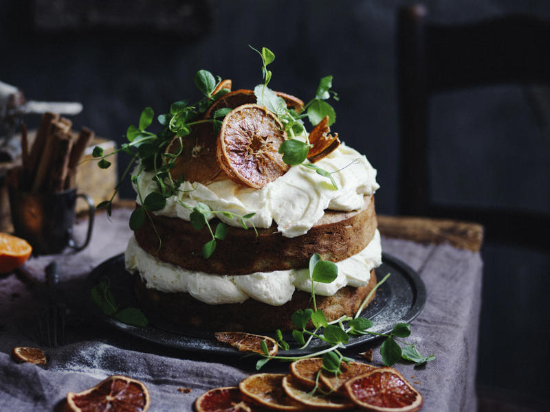 Popular orange varieties for these recipes, Orange recipes to try, Julie Goodwin’s orange almond cake , Flourless orange & white chocolate cake , Double-crumbed pork cotoletta with radicchio & orange salad , Whole orange slice , Orange and blueberry syrup cake , Sugar-free rosemary, labne and orange tart , Hummingbird slice with orange icing , Dark chocolate and orange Christmas slice , Cherry coconut and orange cake , Sweet pea, cinnamon and orange cake , Confit duck & candied orange salad , Chocolate parfait with orange salad , Beetroot and orange salad , Pan-fried fish with radicchio and orange salad , Blood-orange glazed ham , Blood orange hazelnut cake , How to make a chocolate orange ‘tiger’ bundt cake , Green salad with red currants & orange dressing , Orange, poppy seed & olive oil mug cake , Maple, mustard and orange glazed ham , How to choose the best oranges for these recipes, How to remove wax from oranges, Should oranges be stored in or out of the fridge?, How to segment an orange