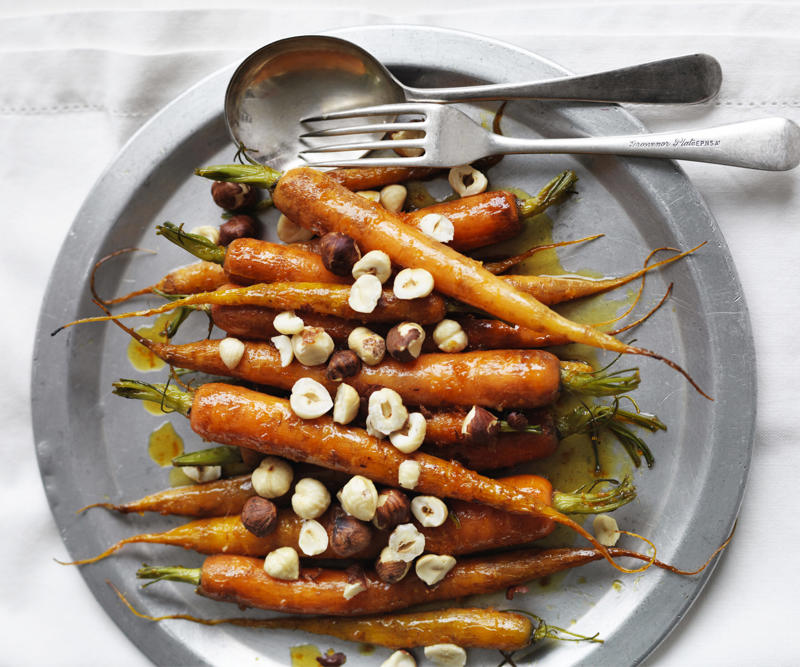 Popular orange varieties for these recipes, Orange recipes to try, Julie Goodwin’s orange almond cake , Flourless orange & white chocolate cake , Double-crumbed pork cotoletta with radicchio & orange salad , Whole orange slice , Orange and blueberry syrup cake , Sugar-free rosemary, labne and orange tart , Hummingbird slice with orange icing , Dark chocolate and orange Christmas slice , Cherry coconut and orange cake , Sweet pea, cinnamon and orange cake , Confit duck & candied orange salad , Chocolate parfait with orange salad , Beetroot and orange salad , Pan-fried fish with radicchio and orange salad , Blood-orange glazed ham , Blood orange hazelnut cake , How to make a chocolate orange ‘tiger’ bundt cake , Green salad with red currants & orange dressing , Orange, poppy seed & olive oil mug cake , Maple, mustard and orange glazed ham , How to choose the best oranges for these recipes, How to remove wax from oranges, Should oranges be stored in or out of the fridge?, How to segment an orange