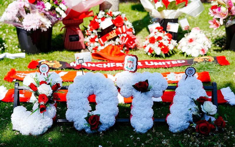 07:09 PM BST, Hughes and Edwards: ‘We feel utterly bereft’, 07:03 PM BST, Pogba posts, 06:49 PM BST, Statement from Fenway Sport Group, 06:40 PM BST, Slot: ‘The pain is so raw’, 05:55 PM BST, Bruno Fernandes posts, 04:50 PM BST, PSG pay tribute, 04:38 PM BST, Bayern do similar at training, 04:32 PM BST, Chelsea pay tribute, 04:14 PM BST, Real Madrid mark Jota’s passing, 03:44 PM BST, Messi posts on Instagram, 03:26 PM BST, More from Jota’s former team Wolves, 02:54 PM BST, Harvey Elliott pays tribute, 02:38 PM BST, Some of the messages left for Jota at Anfield, 02:31 PM BST, Dalglish: ‘Football is not important at this sad time’, 02:16 PM BST, More pictures from outside Anfield, 01:47 PM BST, The Prince and Princess of Wales pay tribute, 01:40 PM BST, More tributes flooding in, 01:37 PM BST, ‘A possible speeding incident’, 01:32 PM BST, Jota ‘will never walk alone’, 01:30 PM BST, Updates from Liverpool, 01:28 PM BST, Map showing location of crash, 01:24 PM BST, Jurgen Klopp: ‘A great friend, loving husband and father’, 01:21 PM BST, Wimbledon reacts to tragedy, 01:15 PM BST, Jamie Carragher on Jota’s death, 01:10 PM BST, Re-live Jota’s finest moments, 01:07 PM BST, Pictured: Crash site, 12:58 PM BST, Darwin Nunez: ‘There are no words of comfort’, 12:54 PM BST, What we know so far..., 12:45 PM BST, Watch: Flag raised at half mast at Anfield, 12:34 PM BST, Deputy Prime Minister visits floral tribute, 12:17 PM BST, Jota death evokes Reyes memories, 12:14 PM BST, Watch: Jota’s message to Liverpool fan, 12:05 PM BST, Watch: the last goal Jota scored for Liverpool, 12:02 PM BST, Emotional scenes at Anfield, 11:48 AM BST, Pictured: A relationship of childhood sweethearts, 11:41 AM BST, Basketball star lends voice to tributes, 11:36 AM BST, ‘Irreparable losses for Portuguese Football’, 11:30 AM BST, Statement from Prime Minister, 11:25 AM BST, Premier League clubs pay tribute, 11:20 AM BST, Ronaldo: ‘It doesn’t make sense’, 11:18 AM BST, Andre Silva with brother at Porto in 2016, 11:12 AM BST, Minute’s silence from Uefa, 11:09 AM BST, Fans already leaving tributes at Anfield, 11:04 AM BST, Pictured: Crash site, 11:01 AM BST, Former club releases statement, 10:56 AM BST, Everton and Manchester United send condolences, 10:54 AM BST, Uefa ‘deeply saddened’ by Jota’s death, 10:49 AM BST, In pictures: Jota’s wedding to childhood sweetheart, 10:47 AM BST, Jota’s ex-Wolves teammates pay tribute, 10:42 AM BST, Pictured: Jota and family celebrate Premier League title, 10:40 AM BST, Jota died ‘after Lamborghini tyre burst’, 10:28 AM BST, Liverpool FC ‘devastated’ by ‘unimaginable loss’, 10:26 AM BST, Jota married childhood sweetheart two weeks ago, 10:22 AM BST, Jota was due to report back for training, 10:16 AM BST, Carragher: ‘I am absolutely devastated’, 10:12 AM BST, Investigation ‘suggests tyre burst’