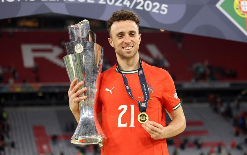 07:09 PM BST, Hughes and Edwards: ‘We feel utterly bereft’, 07:03 PM BST, Pogba posts, 06:49 PM BST, Statement from Fenway Sport Group, 06:40 PM BST, Slot: ‘The pain is so raw’, 05:55 PM BST, Bruno Fernandes posts, 04:50 PM BST, PSG pay tribute, 04:38 PM BST, Bayern do similar at training, 04:32 PM BST, Chelsea pay tribute, 04:14 PM BST, Real Madrid mark Jota’s passing, 03:44 PM BST, Messi posts on Instagram, 03:26 PM BST, More from Jota’s former team Wolves, 02:54 PM BST, Harvey Elliott pays tribute, 02:38 PM BST, Some of the messages left for Jota at Anfield, 02:31 PM BST, Dalglish: ‘Football is not important at this sad time’, 02:16 PM BST, More pictures from outside Anfield, 01:47 PM BST, The Prince and Princess of Wales pay tribute, 01:40 PM BST, More tributes flooding in, 01:37 PM BST, ‘A possible speeding incident’, 01:32 PM BST, Jota ‘will never walk alone’, 01:30 PM BST, Updates from Liverpool, 01:28 PM BST, Map showing location of crash, 01:24 PM BST, Jurgen Klopp: ‘A great friend, loving husband and father’, 01:21 PM BST, Wimbledon reacts to tragedy, 01:15 PM BST, Jamie Carragher on Jota’s death, 01:10 PM BST, Re-live Jota’s finest moments, 01:07 PM BST, Pictured: Crash site, 12:58 PM BST, Darwin Nunez: ‘There are no words of comfort’, 12:54 PM BST, What we know so far..., 12:45 PM BST, Watch: Flag raised at half mast at Anfield, 12:34 PM BST, Deputy Prime Minister visits floral tribute, 12:17 PM BST, Jota death evokes Reyes memories, 12:14 PM BST, Watch: Jota’s message to Liverpool fan, 12:05 PM BST, Watch: the last goal Jota scored for Liverpool, 12:02 PM BST, Emotional scenes at Anfield, 11:48 AM BST, Pictured: A relationship of childhood sweethearts, 11:41 AM BST, Basketball star lends voice to tributes, 11:36 AM BST, ‘Irreparable losses for Portuguese Football’, 11:30 AM BST, Statement from Prime Minister, 11:25 AM BST, Premier League clubs pay tribute, 11:20 AM BST, Ronaldo: ‘It doesn’t make sense’, 11:18 AM BST, Andre Silva with brother at Porto in 2016, 11:12 AM BST, Minute’s silence from Uefa, 11:09 AM BST, Fans already leaving tributes at Anfield, 11:04 AM BST, Pictured: Crash site, 11:01 AM BST, Former club releases statement, 10:56 AM BST, Everton and Manchester United send condolences, 10:54 AM BST, Uefa ‘deeply saddened’ by Jota’s death, 10:49 AM BST, In pictures: Jota’s wedding to childhood sweetheart, 10:47 AM BST, Jota’s ex-Wolves teammates pay tribute, 10:42 AM BST, Pictured: Jota and family celebrate Premier League title, 10:40 AM BST, Jota died ‘after Lamborghini tyre burst’, 10:28 AM BST, Liverpool FC ‘devastated’ by ‘unimaginable loss’, 10:26 AM BST, Jota married childhood sweetheart two weeks ago, 10:22 AM BST, Jota was due to report back for training, 10:16 AM BST, Carragher: ‘I am absolutely devastated’, 10:12 AM BST, Investigation ‘suggests tyre burst’