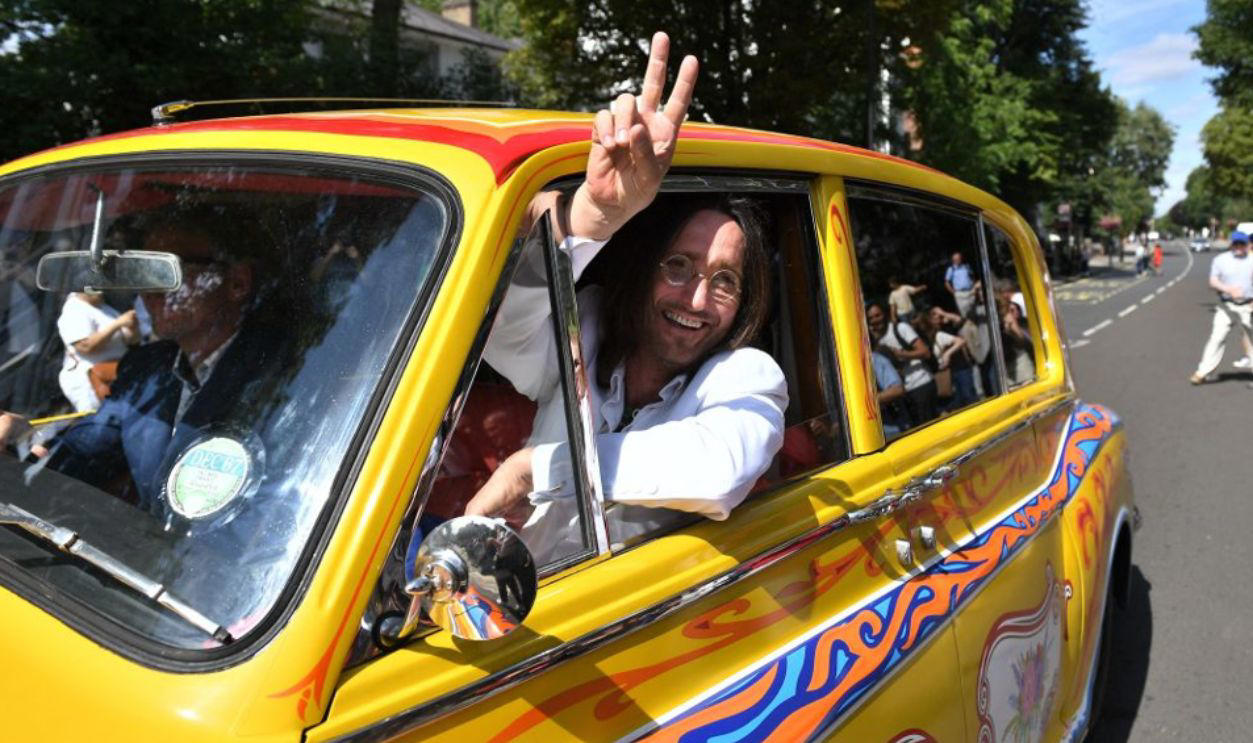 It Wasn’t Just A Showpiece A Rock Star At His Peak And The Car That Reflected It, Why John Chose A Rolls-Royce, Not A Sporty Jaguar, Polished Black And Perfectly Conventional At First, Something Was Missing, The Psychedelic Era Was Exploding, And So Was His Imagination, From Limousine To Canvas: The Idea To Transform It, Inspired By Gypsies, Daydreams, And Eastern Designs, The Painters Behind The Paint Job, What Those Swirls And Motifs Really Meant, Londoners Were Shocked, And Some Were Furious, Art, Rebellion, Or Just Eccentricity?, Snobbery In Overdrive, The Beatles Were Changing, And So Were Their Cars, Lennon’s Rolls Becomes A Rolling Manifesto For Change, It Wasn’t Just A Showpiece, Was It Ever In The Film?, It Was Lennon’s Mobile Stage, Why He Let It Go And The Quiet Goodbye, A Gift To Canada, Its New Home, Faded Paint And Fresh Restorations Over The Years, Decades Later, It’s Still A Symbol Of Creative Defiance, Colorful Legacy