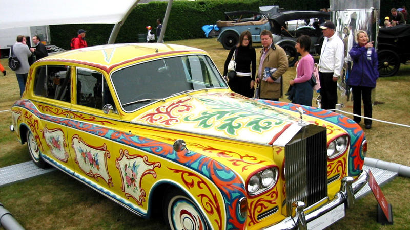 Lennon’s Rolls Becomes A Rolling Manifesto For Change A Rock Star At His Peak And The Car That Reflected It, Why John Chose A Rolls-Royce, Not A Sporty Jaguar, Polished Black And Perfectly Conventional At First, Something Was Missing, The Psychedelic Era Was Exploding, And So Was His Imagination, From Limousine To Canvas: The Idea To Transform It, Inspired By Gypsies, Daydreams, And Eastern Designs, The Painters Behind The Paint Job, What Those Swirls And Motifs Really Meant, Londoners Were Shocked, And Some Were Furious, Art, Rebellion, Or Just Eccentricity?, Snobbery In Overdrive, The Beatles Were Changing, And So Were Their Cars, Lennon’s Rolls Becomes A Rolling Manifesto For Change, It Wasn’t Just A Showpiece, Was It Ever In The Film?, It Was Lennon’s Mobile Stage, Why He Let It Go And The Quiet Goodbye, A Gift To Canada, Its New Home, Faded Paint And Fresh Restorations Over The Years, Decades Later, It’s Still A Symbol Of Creative Defiance, Colorful Legacy