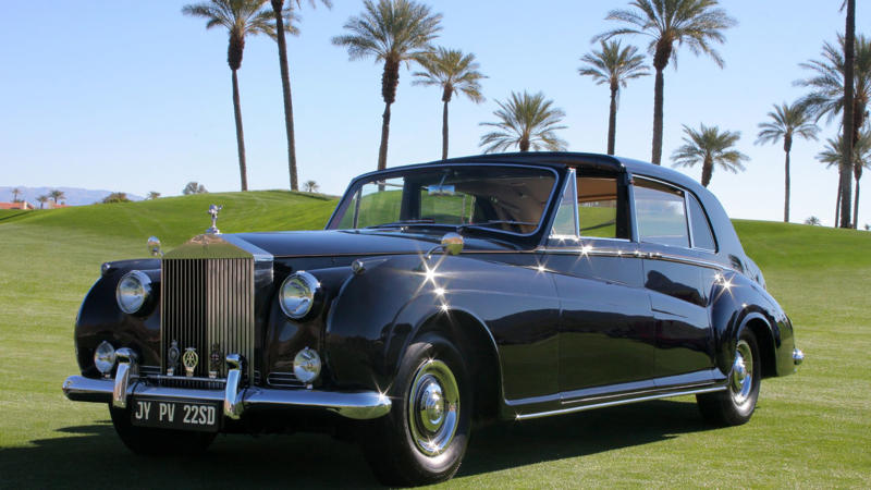 Polished Black And Perfectly Conventional At First A Rock Star At His Peak And The Car That Reflected It, Why John Chose A Rolls-Royce, Not A Sporty Jaguar, Polished Black And Perfectly Conventional At First, Something Was Missing, The Psychedelic Era Was Exploding, And So Was His Imagination, From Limousine To Canvas: The Idea To Transform It, Inspired By Gypsies, Daydreams, And Eastern Designs, The Painters Behind The Paint Job, What Those Swirls And Motifs Really Meant, Londoners Were Shocked, And Some Were Furious, Art, Rebellion, Or Just Eccentricity?, Snobbery In Overdrive, The Beatles Were Changing, And So Were Their Cars, Lennon’s Rolls Becomes A Rolling Manifesto For Change, It Wasn’t Just A Showpiece, Was It Ever In The Film?, It Was Lennon’s Mobile Stage, Why He Let It Go And The Quiet Goodbye, A Gift To Canada, Its New Home, Faded Paint And Fresh Restorations Over The Years, Decades Later, It’s Still A Symbol Of Creative Defiance, Colorful Legacy