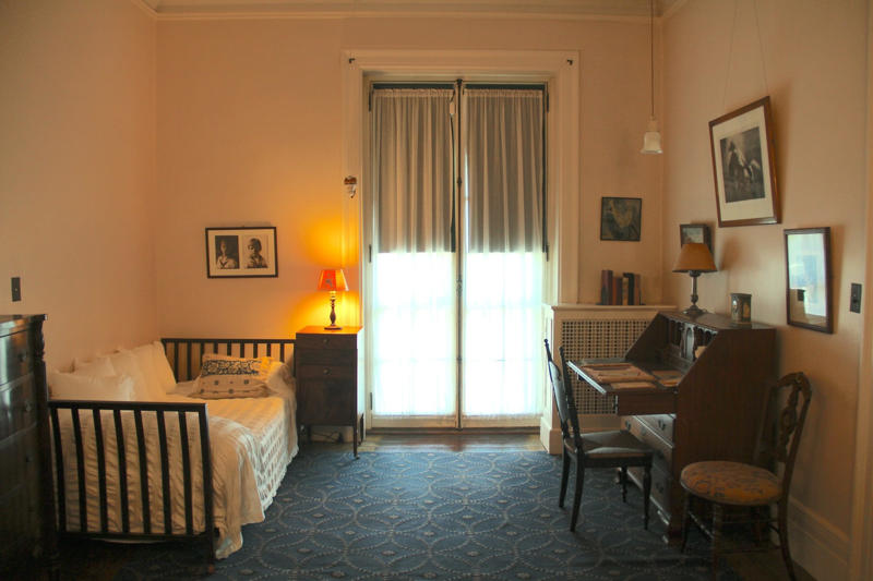 The stables still featured the names of the Roosevelt family's horses., In the Library, Roosevelt met with world leaders and dignitaries., Another guest room was used by his political advisors., Roosevelt was born in the Blue Room on January 30, 1882., Growing up, Roosevelt slept in this bedroom until he married Eleanor in 1905., Roosevelt's bedroom windows featured views of the Hudson River.