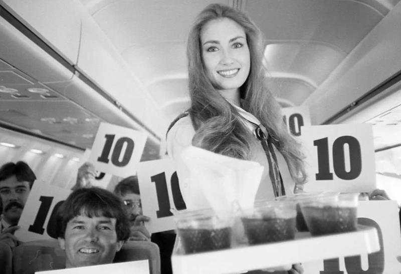 “Southwest Airlines Flight Attendant, Late 70s.” “My dad, probably 1970s. This is my favourite photo of him.”, “Pacific Southwest Airlines Stewardesses from the 70’s.”, “Economy class flying in 1970.”, “70’s Vintage Airline Stewardess.”, “Iran Air flight attendants in the 1970s.”, “First class on a United flight, 1970.”, An American Airlines advertisement from 1971., “Led Zeppelin (Early 1970s).”, “Chilling and smoking mid-air in the 70s.”, “Southwest Airlines Flight Attendant, Late 70s.”, “Elvis Presley & Linda Thompson boarding a plane mid 70’s.”, “My flight attendant mom getting some oxygen for her hangover (70s).”, “Economy seating on Pan Am in the 70s.”, “These Vintage Photos of flight Stewardesses 70’s.”