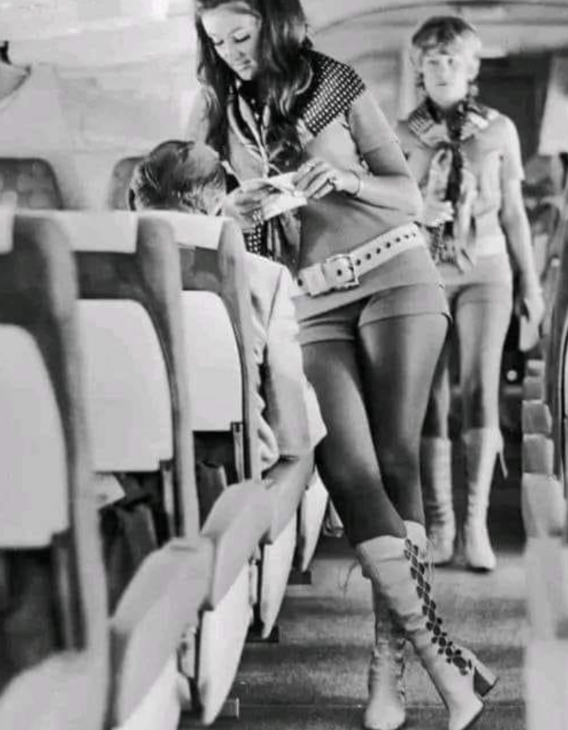 “70’s Vintage Airline Stewardess.” “My dad, probably 1970s. This is my favourite photo of him.”, “Pacific Southwest Airlines Stewardesses from the 70’s.”, “Economy class flying in 1970.”, “70’s Vintage Airline Stewardess.”, “Iran Air flight attendants in the 1970s.”, “First class on a United flight, 1970.”, An American Airlines advertisement from 1971., “Led Zeppelin (Early 1970s).”, “Chilling and smoking mid-air in the 70s.”, “Southwest Airlines Flight Attendant, Late 70s.”, “Elvis Presley & Linda Thompson boarding a plane mid 70’s.”, “My flight attendant mom getting some oxygen for her hangover (70s).”, “Economy seating on Pan Am in the 70s.”, “These Vintage Photos of flight Stewardesses 70’s.”