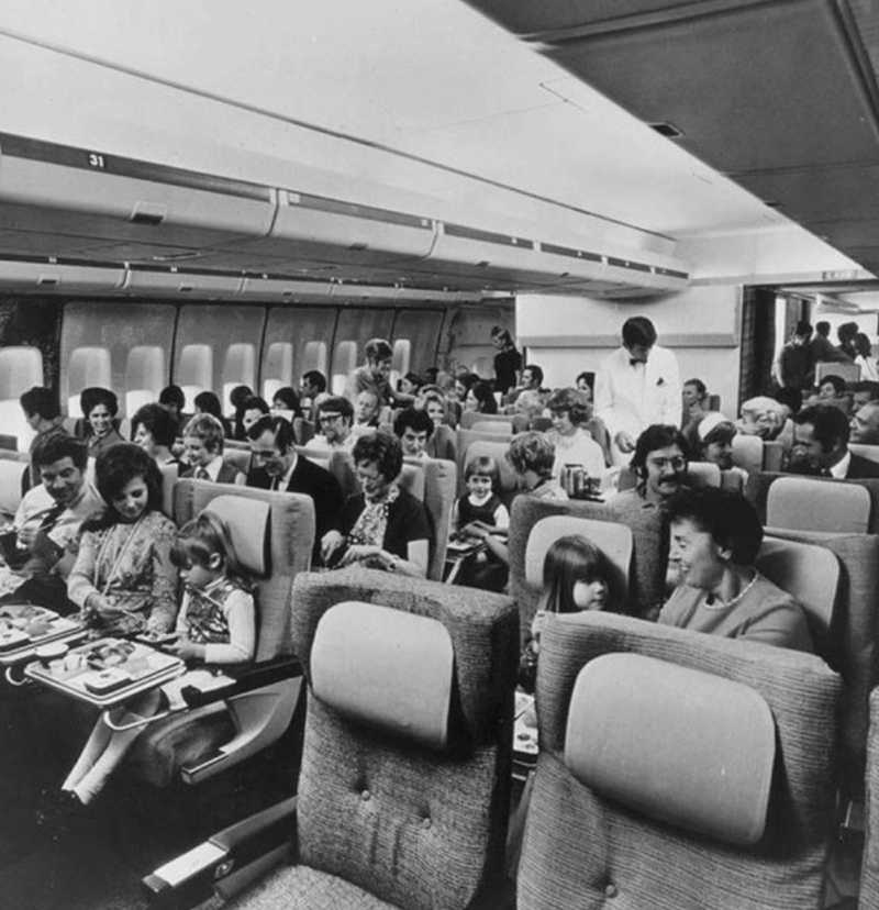 “Economy class flying in 1970.” “My dad, probably 1970s. This is my favourite photo of him.”, “Pacific Southwest Airlines Stewardesses from the 70’s.”, “Economy class flying in 1970.”, “70’s Vintage Airline Stewardess.”, “Iran Air flight attendants in the 1970s.”, “First class on a United flight, 1970.”, An American Airlines advertisement from 1971., “Led Zeppelin (Early 1970s).”, “Chilling and smoking mid-air in the 70s.”, “Southwest Airlines Flight Attendant, Late 70s.”, “Elvis Presley & Linda Thompson boarding a plane mid 70’s.”, “My flight attendant mom getting some oxygen for her hangover (70s).”, “Economy seating on Pan Am in the 70s.”, “These Vintage Photos of flight Stewardesses 70’s.”