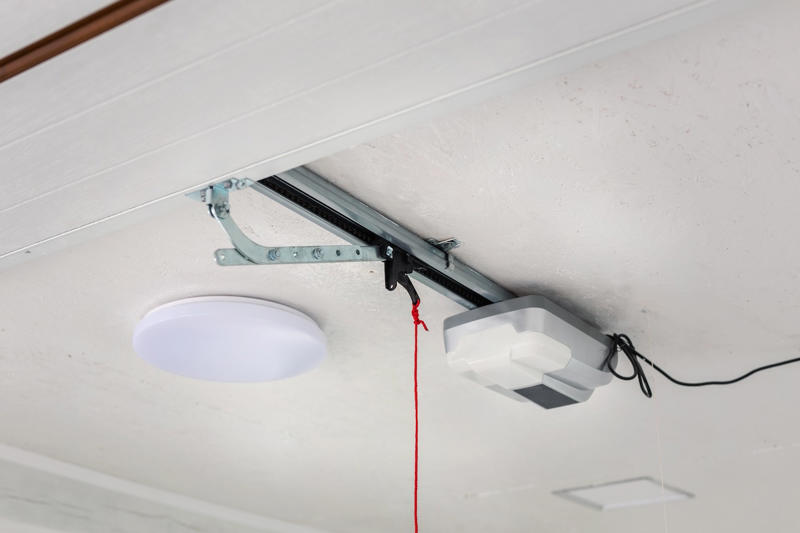 1. Obscure the garage interior by frosting the windows., 2. Monitor activity with a smart garage door opener or other device., 3. Don’t leave your garage door opener in your car., 4. Light up the area to keep intruders away., 5. Add a manual garage lock for extra protection., 6. Lock the door between your garage and your house., 7. Reduce garage break-in risk with security cameras., 8. Stop a common break-in trick with one quick snip.