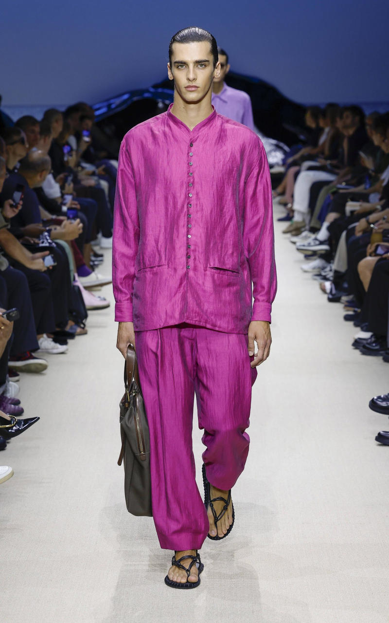 A model wearing an original creation from the spring summer 2026 mens collections from the house of Giorgio Armani Menswear, summer 2026, Giorgio Armani, Milano, Italy Louis Vuitton, Louis Vuitton Menswear 2025/6, Saint Laurent, Saint Laurent Men's Show 2025/6, Giorgio Armani, Prada by Stephen Doig, Dolce & Gabbana