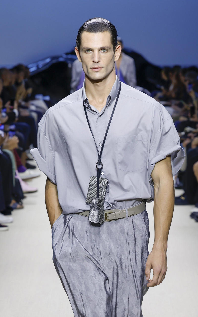 A model wearing an original creation from the spring summer 2026 mens collections from the house of Giorgio Armani Menswear Louis Vuitton, Louis Vuitton Menswear 2025/6, Saint Laurent, Saint Laurent Men's Show 2025/6, Giorgio Armani, Prada by Stephen Doig, Dolce & Gabbana