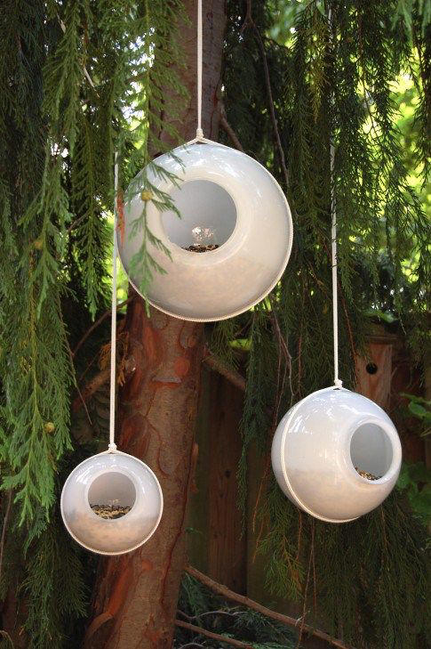 16) Glass Shade Bird Feeder 9) Soda Bottle Bird Feeder, 10) Tea Cup Bird Feeder, 11) Tea Cup Candle Sconce Bird Feeder, 12) Bird and Butterfly Water Feeder, 14) Acorn Bird Feeder, 15) Pine Cone Bird Feeders, 16) Glass Shade Bird Feeder