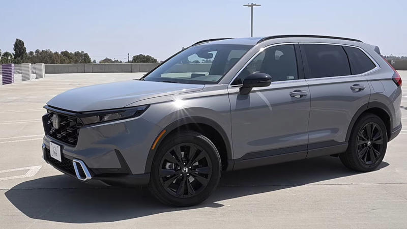 1. Jeep Grand Cherokee 4xe, 2. Mitsubishi Outlander PHEV, 3. Lexus NX 350h, 4. Toyota Venza, 5. Hyundai Tucson Hybrid, 6. Ford Escape Hybrid, 7. Volvo XC60 Recharge, 8. Kia Sorento Hybrid, 9. Mazda CX-90 PHEV, 10. Honda CR-V Sport Touring Hybrid, 1. Toyota RAV4 Hybrid, 2. Hyundai Santa Fe Hybrid, 3. Kia Sportage Hybrid, 4. Ford Explorer Hybrid, 5. Toyota Corolla Cross Hybrid, 6. Subaru Crosstrek Hybrid, 7. Lexus RX 500h, 8. Toyota Highlander Hybrid, 9. BMW X5 xDrive50e, 10. Hyundai Kona Hybrid