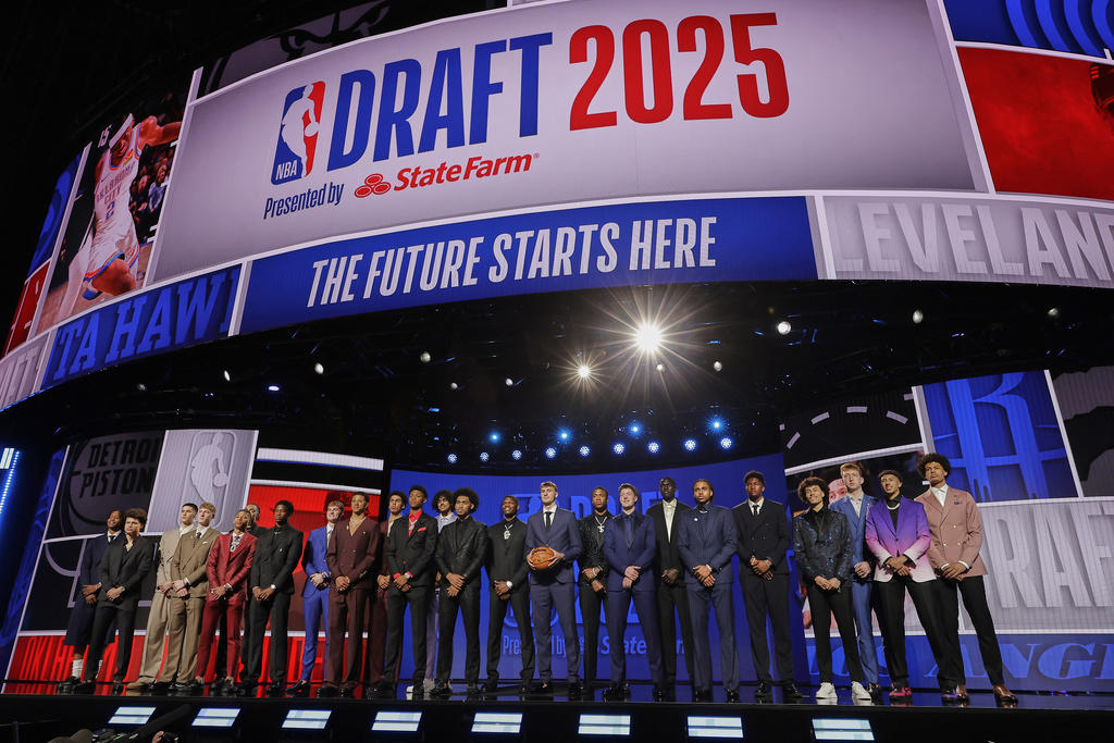 1. Dallas Mavericks — Cooper Flagg, forward, 6-8, 221, Duke, 2. San Antonio Spurs — Dylan Harper, guard, 6-5, 213, Rutgers, 3. Philadelphia 76ers — VJ Edgecombe, guard, 6-4, 193, Baylor, 4. Charlotte Hornets — Kon Knueppel, forward, 6-7, 217, Duke, 5. Utah Jazz — Ace Bailey, forward, 6-8, 203, Rutgers, 6. Washington Wizards — Tre Johnson, guard, 6-5, 190, Texas, 7. New Orleans Pelicans — Jeremiah Fears, guard, 6-3, 180, Oklahoma, 8. Brooklyn Nets — Egor Demin, guard/forward, 6-8, 199, BYU, 9. Toronto Raptors — Collin Murray-Boyles, forward, 6-7, 240, South Carolina, 10. Houston Rockets (traded to Phoenix Suns) — Khaman Maluach, center, 7-1, 253, Duke, 11. Portland Trail Blazers (traded to Memphis Grizzlies) — Cedric Coward, guard, 6-5, 213, Washington State, 12. Chicago Bulls — Noa Essengue, forward, 6-9, 194, Ratiopharm Ulm (Germany), 13. Atlanta Hawks (Traded to New Orleans Pelicans) — Derik Queen, forward/center, 6-9, 248, Maryland, 14. San Antonio Spurs — Carter Bryant, forward, 6-7, 215, Arizona, 15. Oklahoma City Thunder — Thomas Sorber, forward/center, 6-9, 263, Georgetown, 16. Memphis Grizzlies (traded to Portland Trail Blazers) — Hansen Yang, center, 7-1, 249, Qingdao (China), 17. Minnesota Timberwolves — Joan Beringer, center, 6-11, 230, Cedevita Olimpija (Slovenia), 18. Washington Wizards (traded to Utah Jazz) — Walter Clayton Jr., guard, 6-2, 199, Florida, 19. Brooklyn Nets — Nolan Traore, guard, 6-5, 175, Saint-Quentin BB (France), 20. Miami Heat — Kasparas Jakucionis, guard/forward, 6-5, 205, Illinois, 21. Utah Jazz (traded to Washington Wizards) — Will Riley, guard/forward, 6-8, 186, Illinois, 22. Atlanta Hawks (traded to Brooklyn Nets) — Drake Powell, guard/forward, 6-6, 195, North Carolina, 23. New Orleans Pelicans (Traded to Atlanta Hawks) — Asa Newell, forward/center, 6-9, 224, Georgia, 24. Oklahoma City Thunder — Nique Clifford, guard, 6-5, 202, Colorado State, 25. Orlando Magic — Jase Richardson, guard, 6-1, 178, Michigan State, 26. Brooklyn Nets — Ben Saraf, guard, 6-6, 201, Ratiopharm Ulm (Germany), 27. Brooklyn Nets — Danny Wolf, forward/center, 6-11, 252, Michigan, 28. Boston Celtics — Hugo Gonzalez, guard/forward, 6-6, 205, Real Madrid (Spain), 29. Phoenix Suns (traded to Charlotte Hornets) — Liam McNeeley, forward, 6-7, 215, UConn, 30. Los Angeles Clippers — Yanic Konan Niederhauser, forward/center, 6-11, 243, Penn State