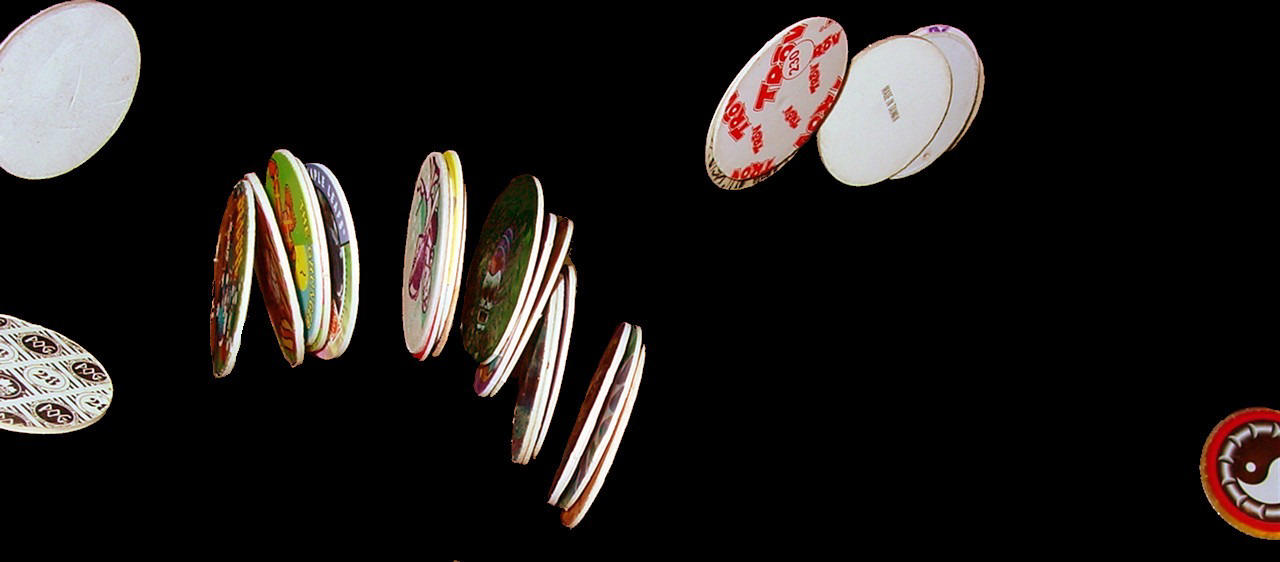 22. Pogs (Milk Caps) 22. Pogs (Milk Caps), 19. Appointment TV, 17. The Mall as a Social Hub, 16. UPN Television Network, 15. Music Videos on MTV, 14. Encarta Encyclopedia, 13. Dial-up Modem, 12. Pen Pals, 11. The Y2K Panic, 10. Discontinued Foods and Drinks, 8. Information Phone Numbers, 7. Rolodex Directory, 6. Adobe Flash, 5. Kodak Disc 4000, 4. Apple Macintosh Portable, 2. RJ Reynolds Premier Cigarette, 1. Steve Urkel Doll