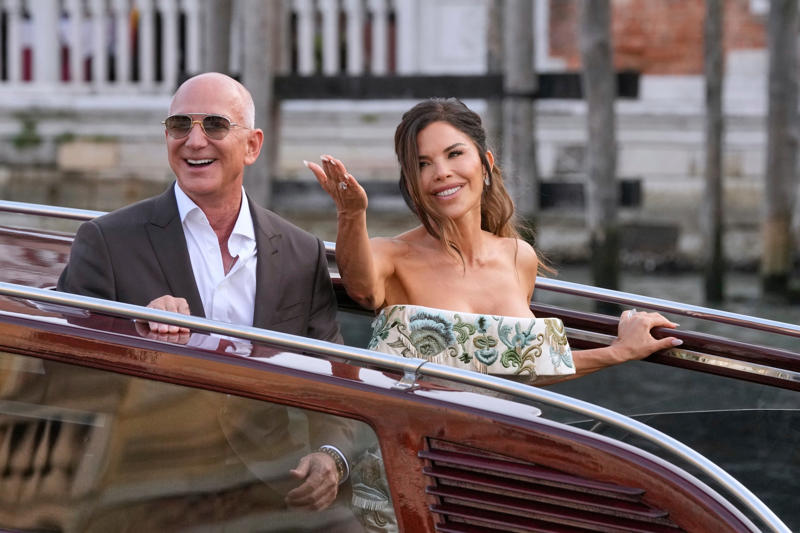 Key Points, Sánchez Bezos posted BTS look from her wedding day, Sánchez Bezos thanks Dolce &amp; Gabbana, The Bezos's step out after the wedding, Sánchez shows off rings, bracelet, How much did Lauren Sánchez pay for her wedding dress?, Sánchez reaches out to Katy Perry amid Orlando Bloom split, Anna Wintour helped Sánchez pick out a wedding gown, Bezos and Sánchez have reportedly signed a prenup, How much will the wedding cost?, When did Bezos and Sánchez get engaged?, Bezos’s gift to Sánchez revealed, Lauren Sánchez's net worth revealed, Jeff Bezos mannequin floats down canal ahead of wedding, President Trump received a wedding invite, Media frenzy continues, A look at who attended the wedding, Best and worst looks revealed, First reaction to Sánchez's wedding dress, Security remains on patrol in Venice, First look at Sánchez's wedding dress, Sánchez changes Instagram name, scrubs account, Controversy over wedding continues to set social media ablaze, Bezos and Sánchez have tied the knot, Sánchez reaches out to Katy Perry amid Orlando Bloom split, Orlando Bloom seen enjoying evening after Katy Perry split, Brooks Nader joins in the party, Onlookers react to Sánchez's demure morning look, Kendall and Kylie Jenner emerge, General wedding attire round up, Kylie Jenner shows off outfit on Instagram, Singer Ellie Goulding joins the party, Orlando Bloom looks sharp, Khloe Kardashian celebrates 41st birthday, Island hosting Friday night's celebration 'to remain open to public', Leonardo DiCaprio continues to hide behind ball cap, Khloe Kardashian opts for a light pink feathered ensemble, Kim Kardashian dons all-black, Kylie Jenner wears ... white?, Kris Jenner and Corey Gamble, Usher and Tom Brady cruise the canals in style, Ivanka Trump gives 'Wicked' vibes, Karlie Kloss seen boarding water taxi, Jewel arrives for the wedding, Oprah Winfrey and Gayle King depart for wedding, Bill Gates leaves Venice hotel, Designers Dolce &amp; Gabbana are in Venice, Bezos's adoptive father spotted, Bezos flanked by security en route to wedding, Bezos emerges from Aman Hotel, Kylie Jenner shares BTS from Thursday night, Onlookers continue to rage against wedding, Sánchez flashes two huge diamonds, Pregnant Karlie Kloss joined by husband Joshua Kushner, Sydney Sweeney joins in the celebrations, Latest wedding venue details revealed, Protests continue in Venice, Lauren Sánchez's net worth revealed, Lauren Sánchez spotted on the morning of her wedding, Kardashians post BTS photos from Thursday, Bill Gates seen with partner Paula Hurd, Blue skies after wild storm, Usher and wife pose for photos ahead of ceremony, Venice wedding day weather report, Orlando Bloom prepares for the ceremony, Best and worst looks roundup, Bezos and Sánchez may already be married, All the celebrities set to attend the wedding, Bezos’s gift to Sánchez revealed, Bezos's lookalike steals the show, Thunderstorm puts swift end to wedding party, When did Bezos and Sánchez get engaged?, Thursday's top-secret bash was 'no phone zone', Bezos and Sánchez show affection in Venice, Ivanka Trump is 'ready to celebrate', Sánchez's dress draws strong opinions, How many water taxis are being used?, How much will the wedding cost?, Kris Jenner and boyfriend Corey Gamble are all smiles, Bezos's gift to Sánchez revealed, Onlookers react to Bezos-Sánchez wedding, Bezos and Sánchez have reportedly signed a prenup, More Venice arrivals, Bezos and Sánchez 'sent guests mood boards', Bezos and Sánchez are keeping details closely guarded, Best and worst looks roundup, Oprah waves to the crowd, Bezos and Sánchez may already be married, A closer look at Lauren Sánchez's dress, Kylie and Kendall Jenner arrive, More royal arrivals in Venice, Leonardo DiCaprio arrives clad in baseball cap, Kim, Khloe, and Kris on the canal, DJ Kygo to perform at wedding, Gayle King, Bill Gates arrive in Venice, Bezos and Sánchez acknowledge his lookalike, Tom Brady boards water taxi, Bezos and Sánchez turn heads leaving luxury hotel, Orlando Bloom spotted with mystery woman, Venice mayor defends luxe nuptials