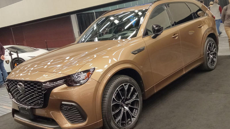 2. 2025 Hyundai Ioniq 6, 3. 2025 Mercedes-Benz EQE Sedan, 4. 2024 Honda Accord Touring, 5. 2025 Ford Mustang Mach-E, 6. 2025 Porsche Taycan, 7. 2025 Kia EV9, 8. 2025 Chevrolet Traverse High Country, 9. 2025 Lexus RX 500h F Sport, 10. 2025 Subaru Outback Touring XT, 11. 2025 Audi Q4 e-tron, 12. 2024 Toyota Grand Highlander Platinum, 13. 2025 Volvo EX30, 14. 2025 Genesis GV80, 15. 2025 Ram 1500 Limited, 16. 2025 Mazda CX-70, 17. 2025 Honda Prologue Elite, 18. 2025 Jeep Grand Cherokee Summit Reserve, 19. 2025 Lucid Air, 20. 2025 Toyota Tacoma Limited