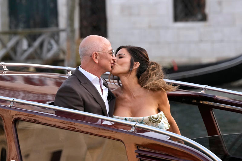 Key Points, Sánchez Bezos posted BTS look from her wedding day, Sánchez Bezos thanks Dolce &amp; Gabbana, The Bezos's step out after the wedding, Sánchez shows off rings, bracelet, How much did Lauren Sánchez pay for her wedding dress?, Sánchez reaches out to Katy Perry amid Orlando Bloom split, Anna Wintour helped Sánchez pick out a wedding gown, Bezos and Sánchez have reportedly signed a prenup, How much will the wedding cost?, When did Bezos and Sánchez get engaged?, Bezos’s gift to Sánchez revealed, Lauren Sánchez's net worth revealed, Jeff Bezos mannequin floats down canal ahead of wedding, President Trump received a wedding invite, Media frenzy continues, A look at who attended the wedding, Best and worst looks revealed, First reaction to Sánchez's wedding dress, Security remains on patrol in Venice, First look at Sánchez's wedding dress, Sánchez changes Instagram name, scrubs account, Controversy over wedding continues to set social media ablaze, Bezos and Sánchez have tied the knot, Sánchez reaches out to Katy Perry amid Orlando Bloom split, Orlando Bloom seen enjoying evening after Katy Perry split, Brooks Nader joins in the party, Onlookers react to Sánchez's demure morning look, Kendall and Kylie Jenner emerge, General wedding attire round up, Kylie Jenner shows off outfit on Instagram, Singer Ellie Goulding joins the party, Orlando Bloom looks sharp, Khloe Kardashian celebrates 41st birthday, Island hosting Friday night's celebration 'to remain open to public', Leonardo DiCaprio continues to hide behind ball cap, Khloe Kardashian opts for a light pink feathered ensemble, Kim Kardashian dons all-black, Kylie Jenner wears ... white?, Kris Jenner and Corey Gamble, Usher and Tom Brady cruise the canals in style, Ivanka Trump gives 'Wicked' vibes, Karlie Kloss seen boarding water taxi, Jewel arrives for the wedding, Oprah Winfrey and Gayle King depart for wedding, Bill Gates leaves Venice hotel, Designers Dolce &amp; Gabbana are in Venice, Bezos's adoptive father spotted, Bezos flanked by security en route to wedding, Bezos emerges from Aman Hotel, Kylie Jenner shares BTS from Thursday night, Onlookers continue to rage against wedding, Sánchez flashes two huge diamonds, Pregnant Karlie Kloss joined by husband Joshua Kushner, Sydney Sweeney joins in the celebrations, Latest wedding venue details revealed, Protests continue in Venice, Lauren Sánchez's net worth revealed, Lauren Sánchez spotted on the morning of her wedding, Kardashians post BTS photos from Thursday, Bill Gates seen with partner Paula Hurd, Blue skies after wild storm, Usher and wife pose for photos ahead of ceremony, Venice wedding day weather report, Orlando Bloom prepares for the ceremony, Best and worst looks roundup, Bezos and Sánchez may already be married, All the celebrities set to attend the wedding, Bezos’s gift to Sánchez revealed, Bezos's lookalike steals the show, Thunderstorm puts swift end to wedding party, When did Bezos and Sánchez get engaged?, Thursday's top-secret bash was 'no phone zone', Bezos and Sánchez show affection in Venice, Ivanka Trump is 'ready to celebrate', Sánchez's dress draws strong opinions, How many water taxis are being used?, How much will the wedding cost?, Kris Jenner and boyfriend Corey Gamble are all smiles, Bezos's gift to Sánchez revealed, Onlookers react to Bezos-Sánchez wedding, Bezos and Sánchez have reportedly signed a prenup, More Venice arrivals, Bezos and Sánchez 'sent guests mood boards', Bezos and Sánchez are keeping details closely guarded, Best and worst looks roundup, Oprah waves to the crowd, Bezos and Sánchez may already be married, A closer look at Lauren Sánchez's dress, Kylie and Kendall Jenner arrive, More royal arrivals in Venice, Leonardo DiCaprio arrives clad in baseball cap, Kim, Khloe, and Kris on the canal, DJ Kygo to perform at wedding, Gayle King, Bill Gates arrive in Venice, Bezos and Sánchez acknowledge his lookalike, Tom Brady boards water taxi, Bezos and Sánchez turn heads leaving luxury hotel, Orlando Bloom spotted with mystery woman, Venice mayor defends luxe nuptials