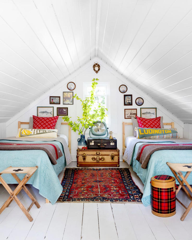 ADIRONDACK FRAMES, VINTAGE LUGGAGE, CRAFT STICK LAMPS, TWIN BEDS (OF COURSE), LEAF MOTIFS, TWO-SEATER TABLES, BANDANA BUNTING, CRISP GREEN PAINT, CANOE PADDLES , PICTURES &amp; POSTCARDS