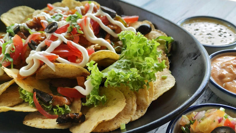 1. Combo Plates, 2. Nachos With Processed Toppings, 3. Chimichangas, 4. Cheese Dips, 5. Hard Shell Tacos, 6. Voluminous Burritos, 7. Sizzling Fajitas, 8. Margaritas, 9. Fried Ice Cream, 10. Taco Salads, 1. Pozole, 2. Tacos Al Pastor, 3. Sopa De Lima, 4. Tlayudas, 5. Cochinita Pibil, 6. Chiles En Nogada, 7. Tamales, 8. Caldo De Res, 9. Fresh And Acid-Cured Ceviche, 10. Enchiladas Verdes With Tomatillo Sauce