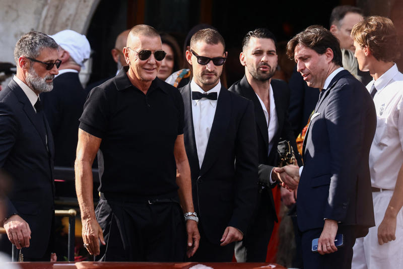 Key Points, Sánchez Bezos posted BTS look from her wedding day, Sánchez Bezos thanks Dolce &amp; Gabbana, The Bezos's step out after the wedding, Sánchez shows off rings, bracelet, How much did Lauren Sánchez pay for her wedding dress?, Sánchez reaches out to Katy Perry amid Orlando Bloom split, Anna Wintour helped Sánchez pick out a wedding gown, Bezos and Sánchez have reportedly signed a prenup, How much will the wedding cost?, When did Bezos and Sánchez get engaged?, Bezos’s gift to Sánchez revealed, Lauren Sánchez's net worth revealed, Jeff Bezos mannequin floats down canal ahead of wedding, President Trump received a wedding invite, Media frenzy continues, A look at who attended the wedding, Best and worst looks revealed, First reaction to Sánchez's wedding dress, Security remains on patrol in Venice, First look at Sánchez's wedding dress, Sánchez changes Instagram name, scrubs account, Controversy over wedding continues to set social media ablaze, Bezos and Sánchez have tied the knot, Sánchez reaches out to Katy Perry amid Orlando Bloom split, Orlando Bloom seen enjoying evening after Katy Perry split, Brooks Nader joins in the party, Onlookers react to Sánchez's demure morning look, Kendall and Kylie Jenner emerge, General wedding attire round up, Kylie Jenner shows off outfit on Instagram, Singer Ellie Goulding joins the party, Orlando Bloom looks sharp, Khloe Kardashian celebrates 41st birthday, Island hosting Friday night's celebration 'to remain open to public', Leonardo DiCaprio continues to hide behind ball cap, Khloe Kardashian opts for a light pink feathered ensemble, Kim Kardashian dons all-black, Kylie Jenner wears ... white?, Kris Jenner and Corey Gamble, Usher and Tom Brady cruise the canals in style, Ivanka Trump gives 'Wicked' vibes, Karlie Kloss seen boarding water taxi, Jewel arrives for the wedding, Oprah Winfrey and Gayle King depart for wedding, Bill Gates leaves Venice hotel, Designers Dolce &amp; Gabbana are in Venice, Bezos's adoptive father spotted, Bezos flanked by security en route to wedding, Bezos emerges from Aman Hotel, Kylie Jenner shares BTS from Thursday night, Onlookers continue to rage against wedding, Sánchez flashes two huge diamonds, Pregnant Karlie Kloss joined by husband Joshua Kushner, Sydney Sweeney joins in the celebrations, Latest wedding venue details revealed, Protests continue in Venice, Lauren Sánchez's net worth revealed, Lauren Sánchez spotted on the morning of her wedding, Kardashians post BTS photos from Thursday, Bill Gates seen with partner Paula Hurd, Blue skies after wild storm, Usher and wife pose for photos ahead of ceremony, Venice wedding day weather report, Orlando Bloom prepares for the ceremony, Best and worst looks roundup, Bezos and Sánchez may already be married, All the celebrities set to attend the wedding, Bezos’s gift to Sánchez revealed, Bezos's lookalike steals the show, Thunderstorm puts swift end to wedding party, When did Bezos and Sánchez get engaged?, Thursday's top-secret bash was 'no phone zone', Bezos and Sánchez show affection in Venice, Ivanka Trump is 'ready to celebrate', Sánchez's dress draws strong opinions, How many water taxis are being used?, How much will the wedding cost?, Kris Jenner and boyfriend Corey Gamble are all smiles, Bezos's gift to Sánchez revealed, Onlookers react to Bezos-Sánchez wedding, Bezos and Sánchez have reportedly signed a prenup, More Venice arrivals, Bezos and Sánchez 'sent guests mood boards', Bezos and Sánchez are keeping details closely guarded, Best and worst looks roundup, Oprah waves to the crowd, Bezos and Sánchez may already be married, A closer look at Lauren Sánchez's dress, Kylie and Kendall Jenner arrive, More royal arrivals in Venice, Leonardo DiCaprio arrives clad in baseball cap, Kim, Khloe, and Kris on the canal, DJ Kygo to perform at wedding, Gayle King, Bill Gates arrive in Venice, Bezos and Sánchez acknowledge his lookalike, Tom Brady boards water taxi, Bezos and Sánchez turn heads leaving luxury hotel, Orlando Bloom spotted with mystery woman, Venice mayor defends luxe nuptials