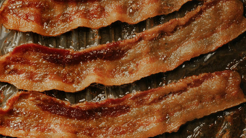 The Biggest Contributors of Heart Disease 1. Bacon, 2. Steaks, 3. Poultry, 4. Potatoes, 5. Cereal, 6. Nacho Chips, 7. Deli Meats, 8. Croissants, 9. White Bread, 10. Butter, 11. Soda, 12. Cookies, 13. Yogurt, 14. White Rice, 15. Canned Soup, 16. Potato Chips, 17. Chicken Nuggets, 18. Ranch Dressing, 19. Ice Cream, 20. Garlic Bread
