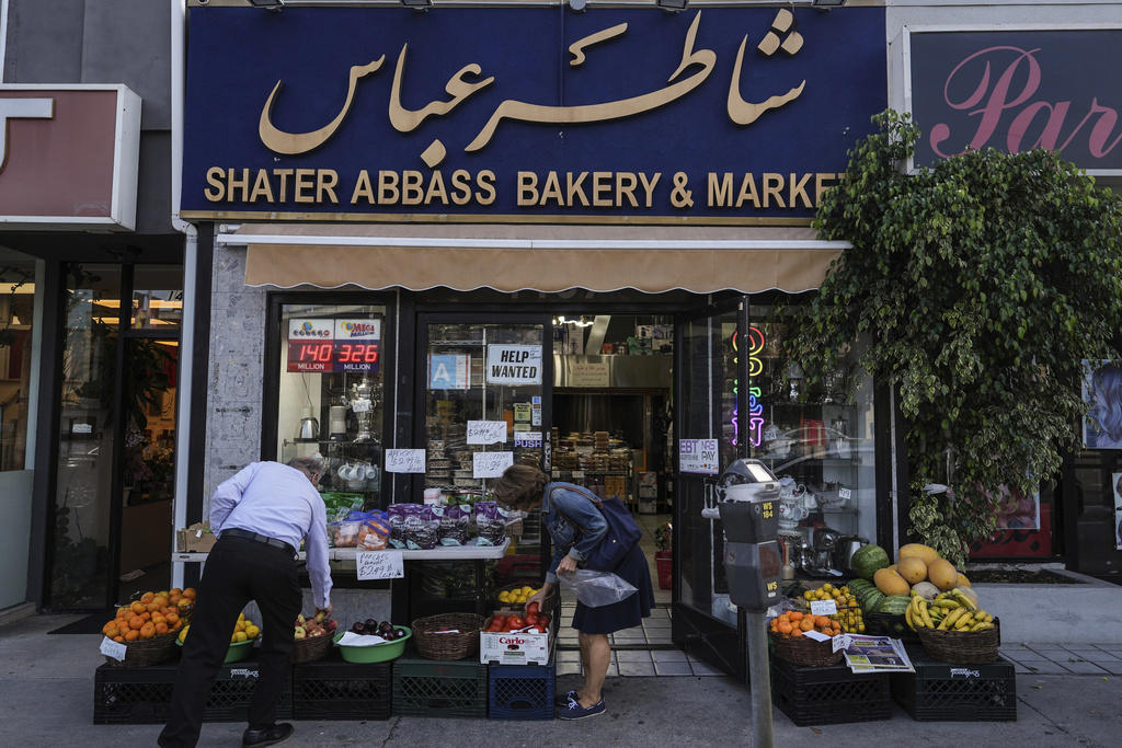 Cultural enclave offers a sense of grounding, A test for long-held bonds, A time of fear and uncertainty, A call for regime change in Iran, Desire for unity and common ground