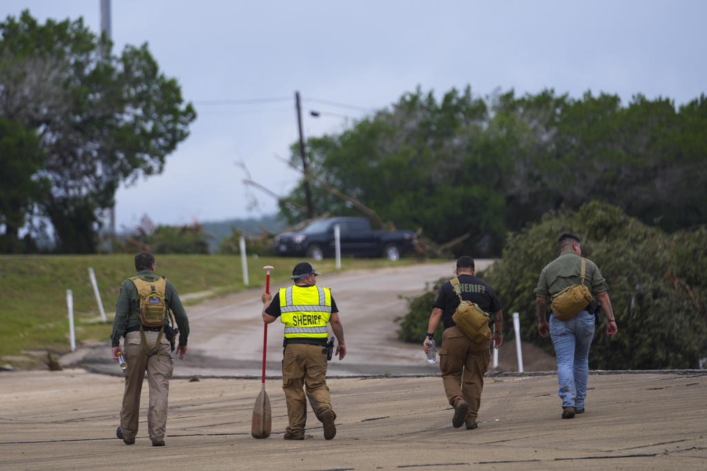 Raging storm hit camp in middle of the night, Helicopters, drones used in frantic search for missing, Residents clung to trees, fled to attics, ‘No one knew this kind of flood was coming’, More pockets of heavy rains expected