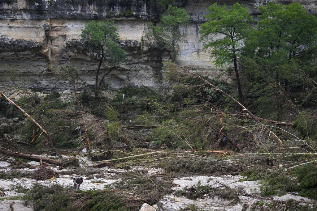 Raging storm hit camp in middle of the night, Helicopters and drones used in frantic search, People clung to trees and fled to attics, ‘Nobody saw this coming’