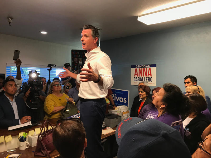 Gavin Newsom speaks in Salinas to support Democrats Gas pumps in Oklahoma City, December 5, 2023, Cars at gas pumps during Wawa opening, April 24, 2025, Man pumping gas in Kingston, Ohio, June 24, 2025, Woman assisting aunt off electric bus for testing, Gavin Newsom speaks in Salinas to support Democrats, Gavin Newsom speaking to fifth-graders in California, Gavin Newsom speaking to first-graders in California