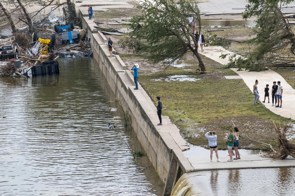 Raging storm hit camp in middle of the night, Helicopters and drones used in frantic search, People clung to trees and fled to attics, ‘Nobody saw this coming’