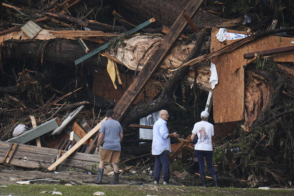 Raging storm hit camp in middle of the night, Helicopters, drones used in frantic search for missing, Residents clung to trees, fled to attics, ‘No one knew this kind of flood was coming’, More pockets of heavy rains expected