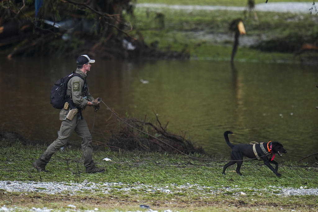 Raging storm hit camp in middle of the night, Helicopters, drones used in frantic search for missing, Residents clung to trees, fled to attics, ‘No one knew this kind of flood was coming’, More pockets of heavy rains expected