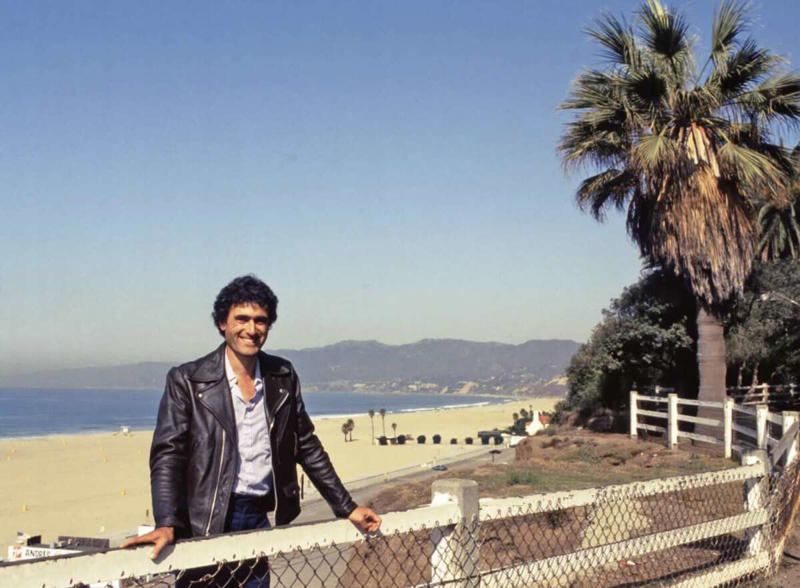 6. Maurice Zeitlin, the professor of sociology at UCLa 1. Throwing it back all the way to the year of 1982, when the times were electric, 2. Someone's dad posted up in Berlin back in 1982, 3. You've got to love the big hair with the birthday cake, 4. The Space Shuttle Challenger just being towed along in the street back in 1982, 5. Epcot, Orlando, Florida, 1982, 6. Maurice Zeitlin, the professor of sociology at UCLa, 7. The 1982 National Clubs Tournament, 8. The marching band in England in 1982, 9. Stranded passengers using pay-phones at the airport in 1982, 10. Hitting the boombox in 1982, 11. Growing up back in 1982, 12. Silver Queen Hotel in 1982, 13. A group of punks in East Berlin, Germany, circa 1982, 14. Hanging out on her first backpacking trip back in 1982, 15. Aboard a ship from a Norwegian cruise line back in 1982, 16. The New York subway in 1982, 17. Venice Beach, California, September, 1982, 18. A solid California wedding in 1982, 19. New York in 1982