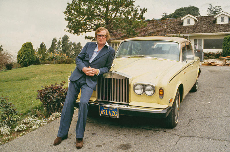 Michael Caine - Rolls-Royce Silver Shadow Famous people and nice cars have always had a close connection., The Rolling Stones - 1935 Bentley 3½ Litre, John Lennon - Rolls-Royce Phantom V, The Beatles - Triumph Herald, Steve McQueen - Ferrari 250 GT Lusso, Mick Jagger - Aston Martin DB6, Twiggy – Mercedes-Benz 250 SL, Keith Moon, James Brown & Muhammad Ali – 1966 Cadillac DeVille Convertible, Tony Curtis - Alvis TE21, The Who – Volvo P1800, Clint Eastwood – Austin-Healey 100M, Elvis Presley – Ford Thunderbird, Marvin Gaye – Rolls-Royce Phantom V, Led Zeppelin – Jaguar S-Type, Roger Moore – Volvo P1800, Roy Orbison – Rolls-Royce Phantom V, The Beatles – 1964 Ford Galaxie, John Lennon – Austin Maxi, Rod Stewart – Lamborghini Miura P400, Alice Cooper & Keith Moon - Rolls-Royces, Steve McQueen - Ferrari 275 GTS Convertible, Richard Burton – 1961 Rolls-Royce Silver Cloud II Drophead Coupé, Dean Martin – Jaguar E-Type, John Lennon – Radford Mini de Ville, Richard Burton & Elizabeth Taylor –Rolls-Royce Silver Wraith, Elvis Presley – BMW 507, Paul McCartney – Mini Cooper S De Ville, Johnny Hallyday – Triumph TR3, The Jackson Five & Diana Ross – Jaguar E-Type, John Lennon – Mercedes-Benz 600 Pullman, Michael Caine - Rolls-Royce Silver Shadow