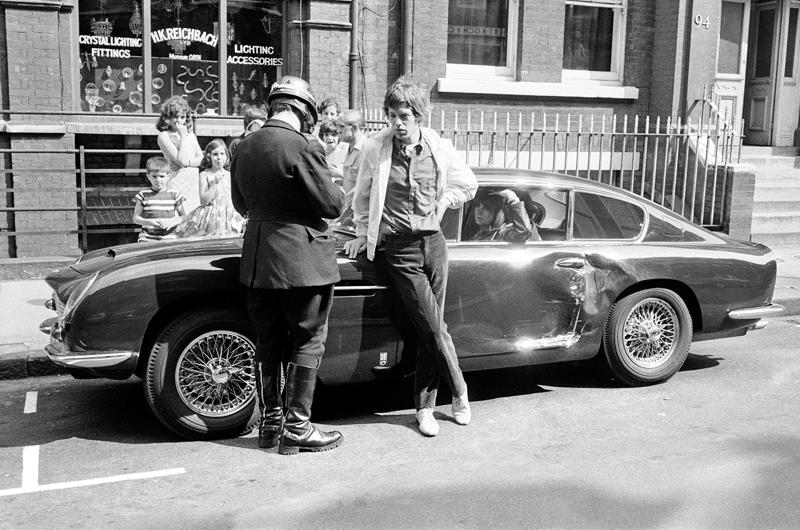 Mick Jagger - Aston Martin DB6 Famous people and nice cars have always had a close connection., The Rolling Stones - 1935 Bentley 3½ Litre, John Lennon - Rolls-Royce Phantom V, The Beatles - Triumph Herald, Steve McQueen - Ferrari 250 GT Lusso, Mick Jagger - Aston Martin DB6, Twiggy – Mercedes-Benz 250 SL, Keith Moon, James Brown & Muhammad Ali – 1966 Cadillac DeVille Convertible, Tony Curtis - Alvis TE21, The Who – Volvo P1800, Clint Eastwood – Austin-Healey 100M, Elvis Presley – Ford Thunderbird, Marvin Gaye – Rolls-Royce Phantom V, Led Zeppelin – Jaguar S-Type, Roger Moore – Volvo P1800, Roy Orbison – Rolls-Royce Phantom V, The Beatles – 1964 Ford Galaxie, John Lennon – Austin Maxi, Rod Stewart – Lamborghini Miura P400, Alice Cooper & Keith Moon - Rolls-Royces, Steve McQueen - Ferrari 275 GTS Convertible, Richard Burton – 1961 Rolls-Royce Silver Cloud II Drophead Coupé, Dean Martin – Jaguar E-Type, John Lennon – Radford Mini de Ville, Richard Burton & Elizabeth Taylor –Rolls-Royce Silver Wraith, Elvis Presley – BMW 507, Paul McCartney – Mini Cooper S De Ville, Johnny Hallyday – Triumph TR3, The Jackson Five & Diana Ross – Jaguar E-Type, John Lennon – Mercedes-Benz 600 Pullman, Michael Caine - Rolls-Royce Silver Shadow