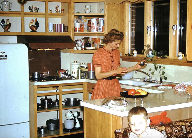 10. Hanging in the kitchen in New York, 1955 1. A couple of the parents hanging around back in 1955, 2. A London record store back in 1955 with customers hanging out in their lovely listening booths, 3. A Debutant Ball back in 1955, 4. A couple of the grandparents hanging out in their home back in 1955 in Illinois, 5. Spain, circa 1955, 6. Girls from Germany in 1955, 7. Throwing it all the way back to July 2nd, 1955, 8. A lovely shot from school out in Sweden in 1955, 9. Manhattan, Times Square, 1955, 10. Hanging in the kitchen in New York, 1955, 11. The fish was delightful back in 1955, 12. Riding in the front with mom in 1955, 13. Drag racing in Los Angeles in 1955, 14. East Pender Street in Vancouver, BC, 1955, 15. A man bragging out in Spain in 1955, 16. East Harlem, New York City, circa 1955, 17. Harris and McKeever Market in Pittsburgh, circa 1955, 18. Commuters reading their newspapers on a train in Philadelphia, circa 1955, 19. A solid roller skating faceplant moment, 20. The scooter kids hanging out in Bonn, Germany, 1955, 21. All aboard for that sweet Saturday afternoon matinee, 22. Women and children hanging out at a pier in Hong Kong, circa 1955, 23. A busy mom out in New Rochelle, New York, 1955